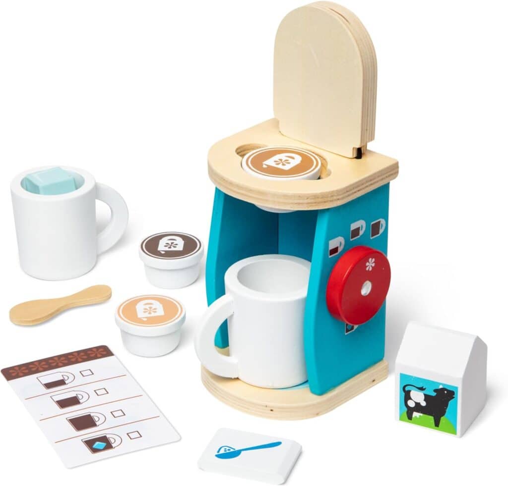 A Melissa & Doug Brew and Serve Wooden Coffee Maker Set with cups and mugs.