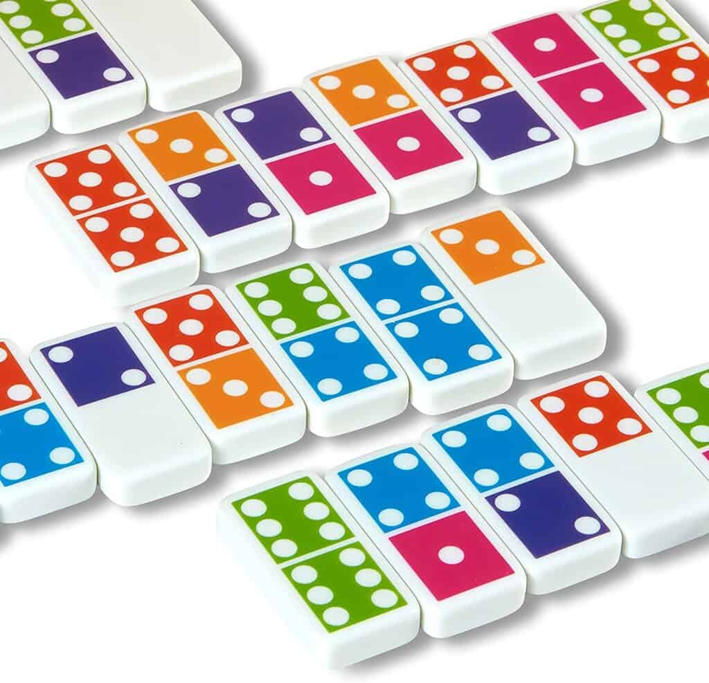 A Melissa & Doug Dominoes Tabletop Game 28 Colorful Tiles on a white surface.