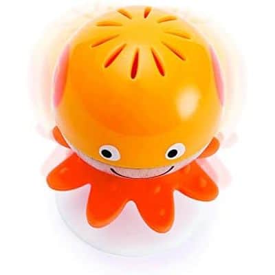 A Hape Put-Stay Sea Animal Suction Rattle Set Three Toys shaped like an octopus sitting on top of a white surface.