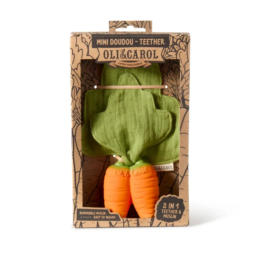 A toy with Oli & Carol Cathy the Carrot Mini Doudou Teether Natural Rubber in the packaging.