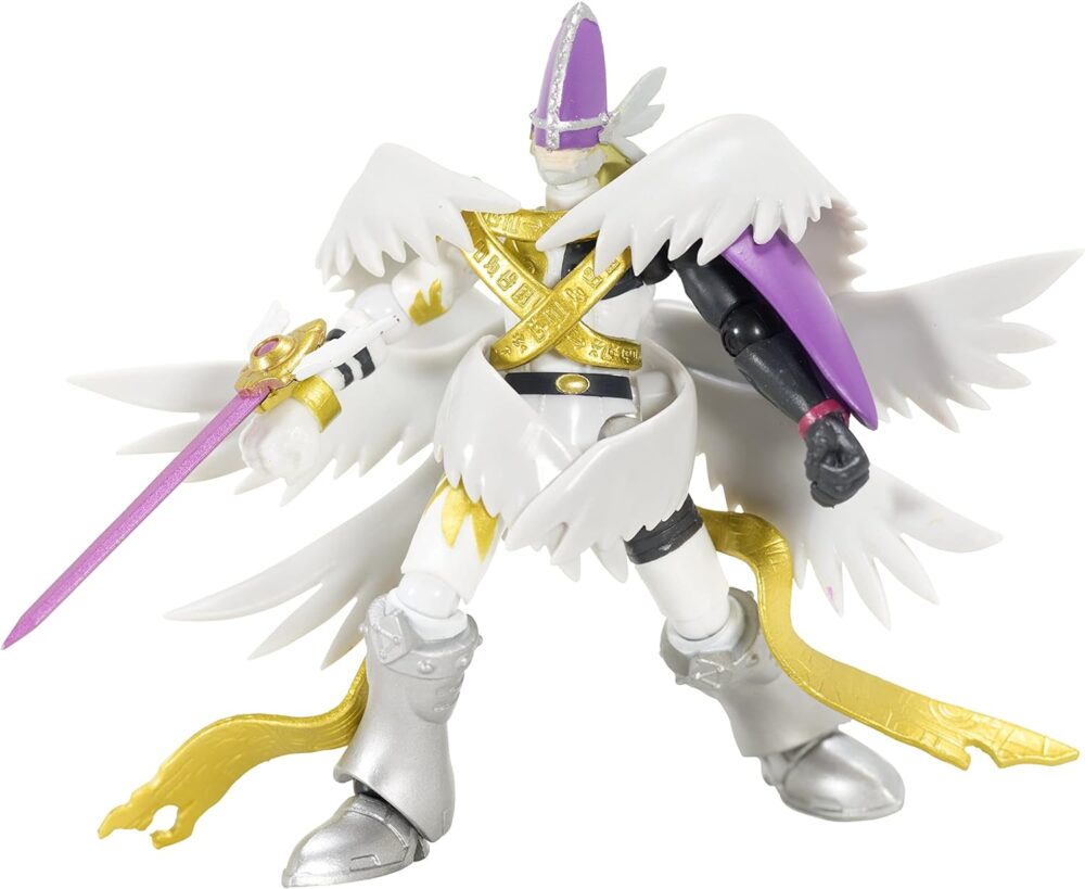 A white-armored toy figure with feathered wings, a purple helmet, and gold accents. The figure holds a purple sword in its right hand and has a purple shield on its left arm.