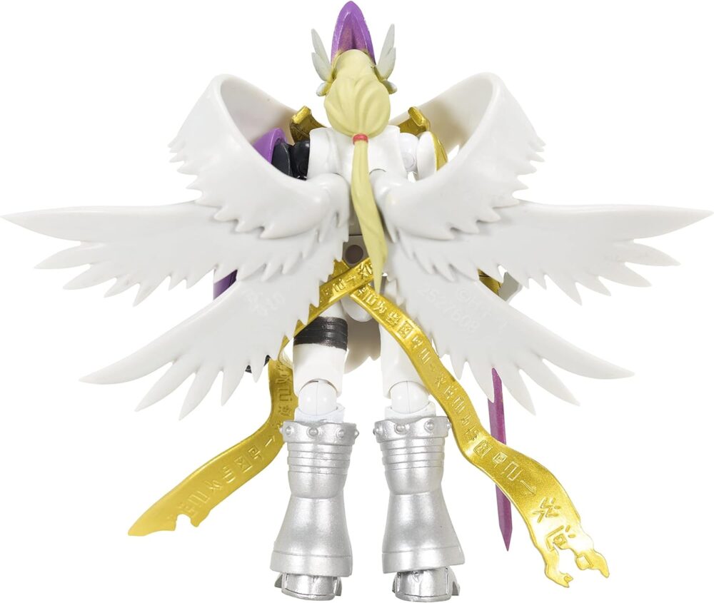A detailed figurine of a character with white wings, long blonde hair, silver boots, and golden ribbons with inscriptions, viewed from the back.