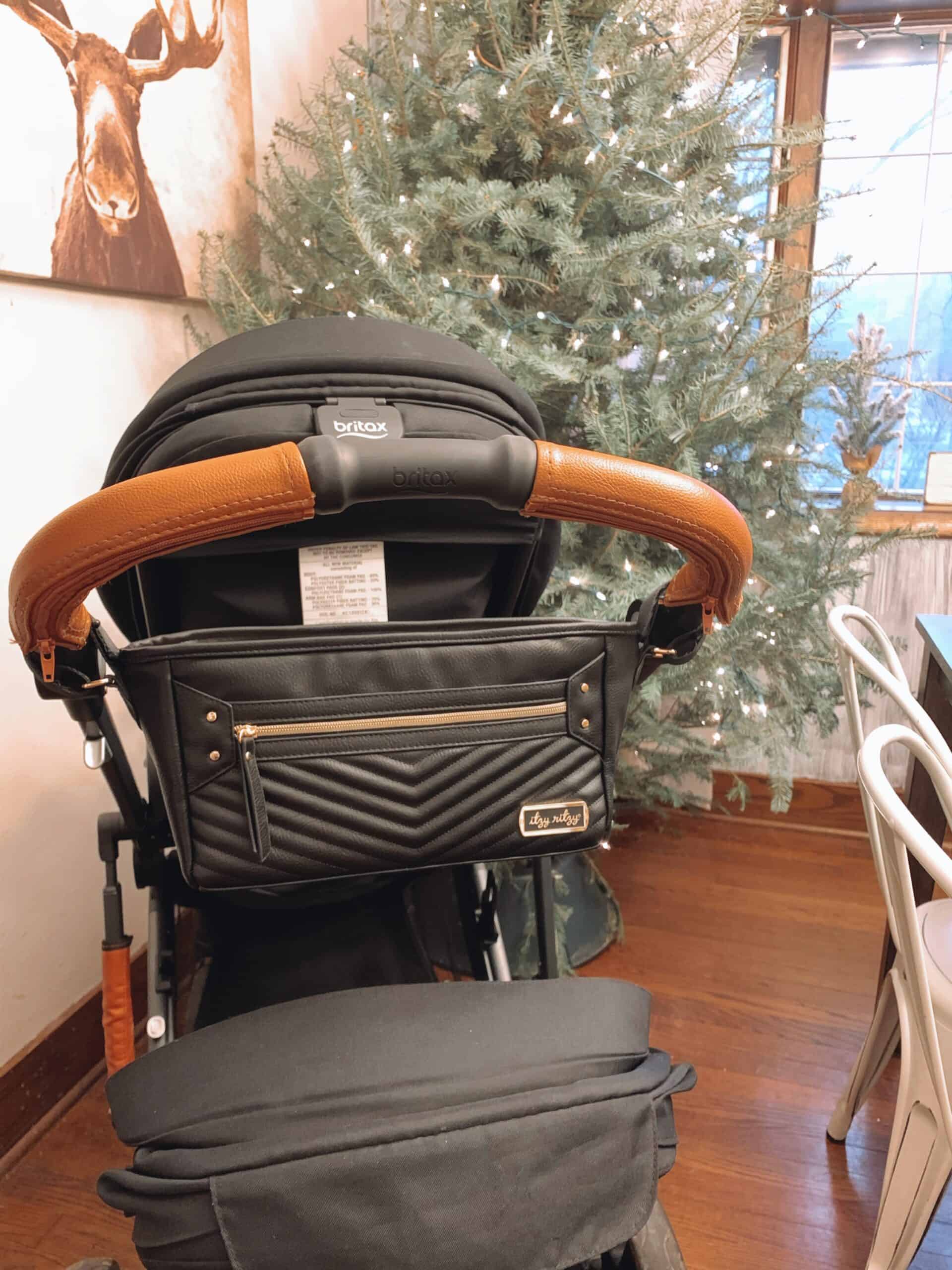 Itzy-Ritzy-Baby-Stroller-Storage-Organizer-CAD8368-Stroller-Caddy-Jetsetter-Black-Gold-3-scaled