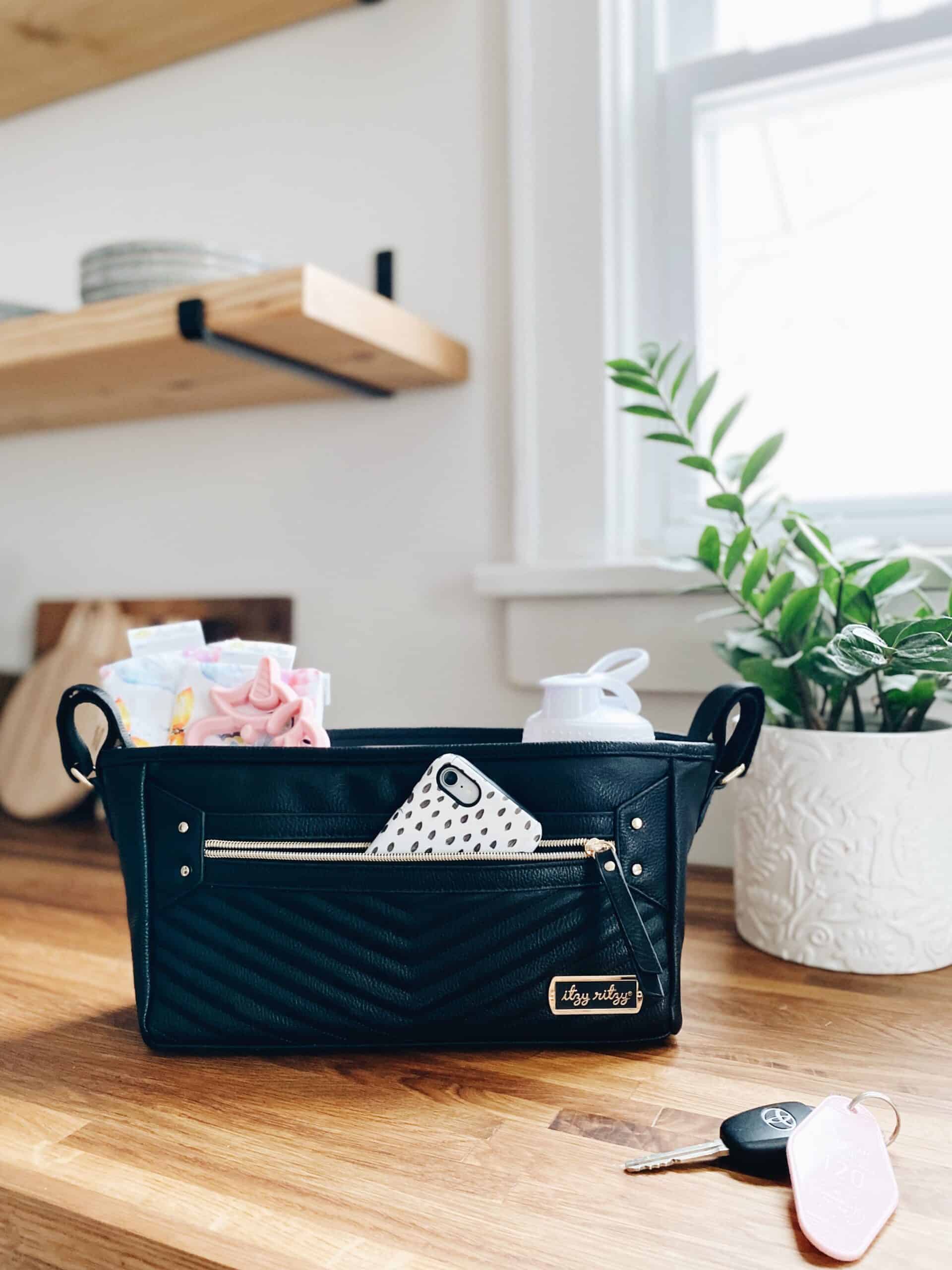 Itzy-Ritzy-Baby-Stroller-Storage-Organizer-CAD8368-Stroller-Caddy-Jetsetter-Black-Gold-9-scaled