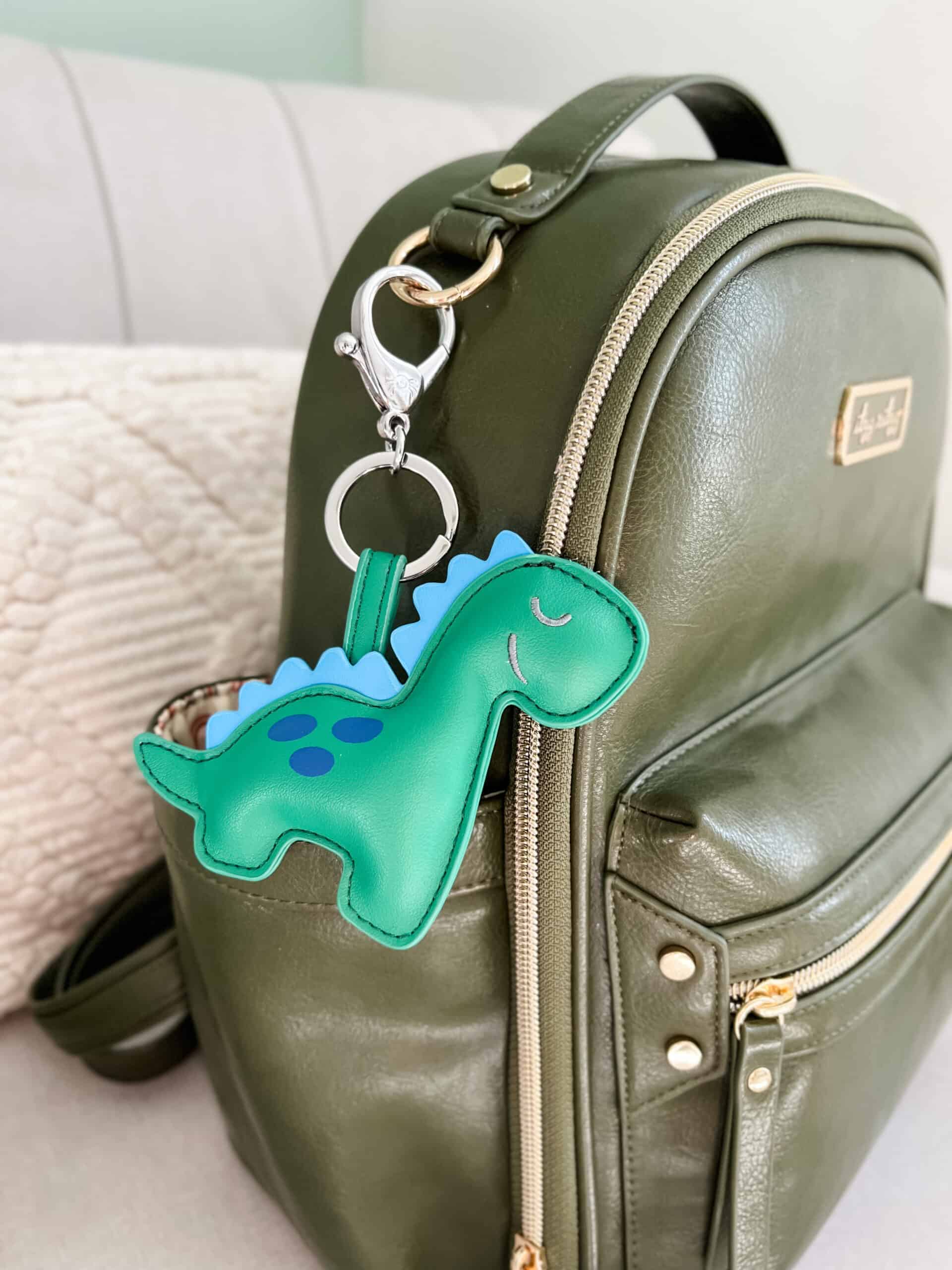 Itzy-Ritzy-Diaper-Bag-Accessories-CKP8085-Puffy-Charm-Dino-scaled