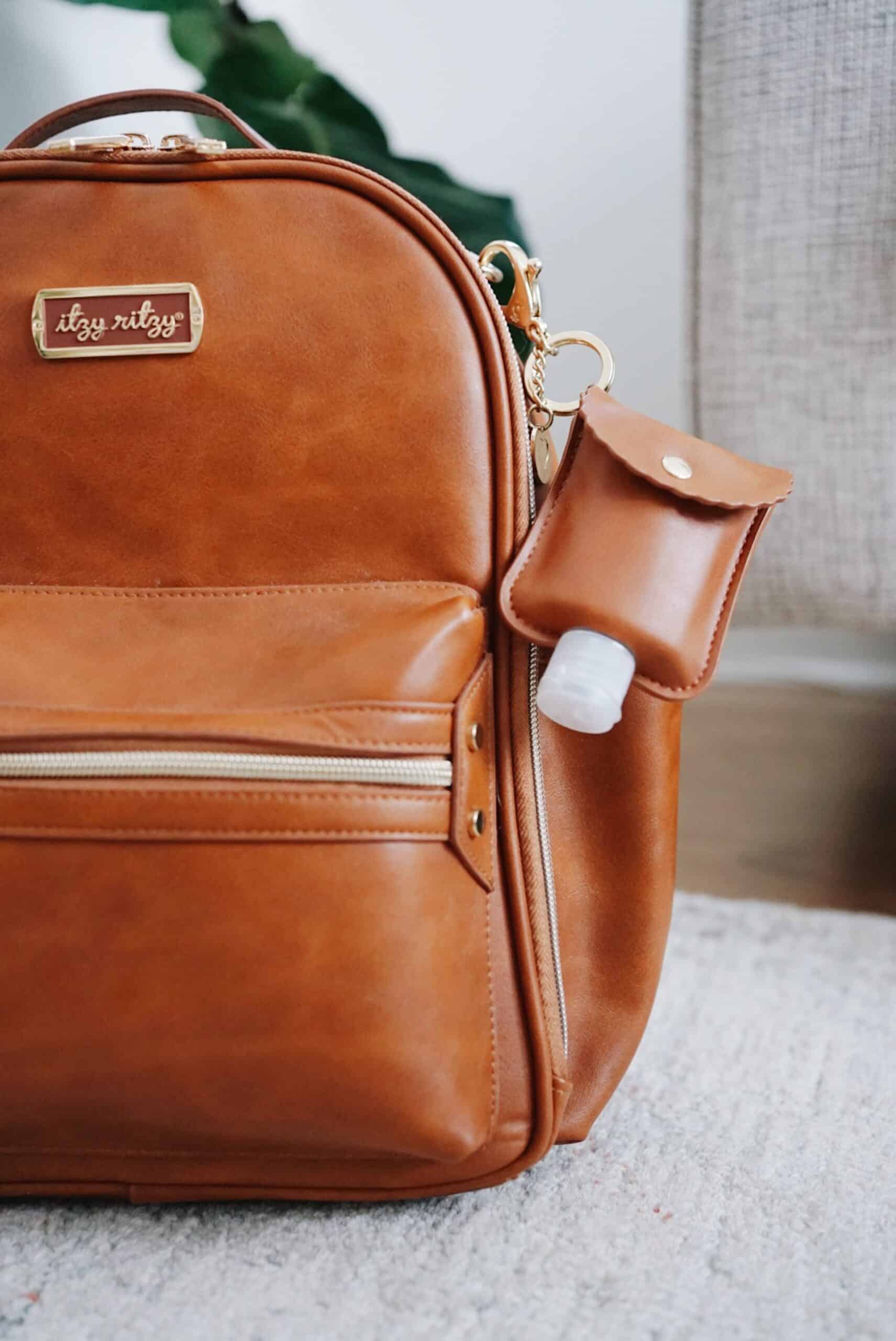 Itzy-Ritzy-Sanitizer-Holder-Case-Clip-Bag-Purse-HSP8406-Cognac-Hand-Sanitizer-Pouch-4-scaled