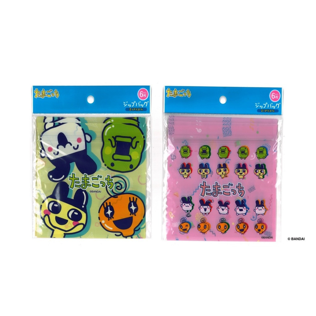 daiso-tamagotchi-130 Two packs of Daiso Tamagotchi Masking Tape Zip Bags—one featuring large green and yellow characters, the other pink with rows of smaller colorful characters—both in clear packaging with blue labels, official Bandai Tama goods Japan stationery.