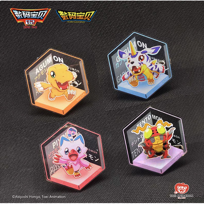 Four hexagonal acrylic stands from the “Digimon Adventure Digital Monster Toei Animation Acrylic Badge Hexagonal Hexagon Figure Toy” collection display cartoon Digimon characters—Agumon, Gabumon, Biyomon, and Tentomon—each on a differently colored base, set against a textured dark background.