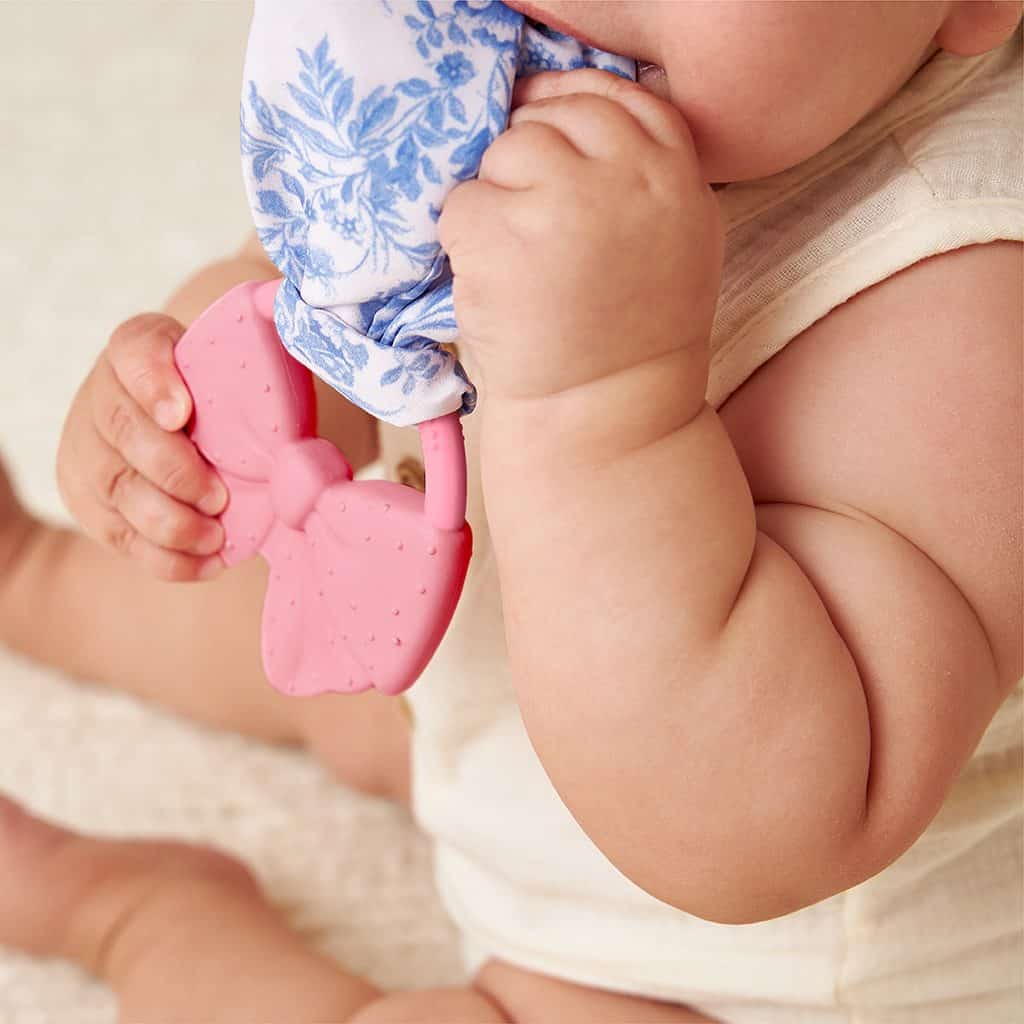 Itzy Ritzy Crinkle Crew silicone teether with crinkle tie, Bow design Itzy Ritzy Crinkle Crew silicone teether with crinkle tie, Bow design