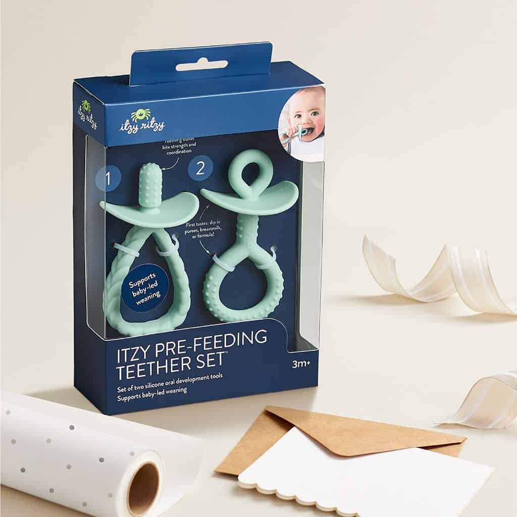 Itzy Ritzy Itzy Pre Feeding teether set with looped handles in green Itzy Ritzy Itzy Pre Feeding teether set with looped handles in green
