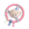 itzy-ring-pal-kitty-01 Pink textured teething ring with a plush cat face in the center and three ribbon tags in pink, blue, and white attached to the bottom.