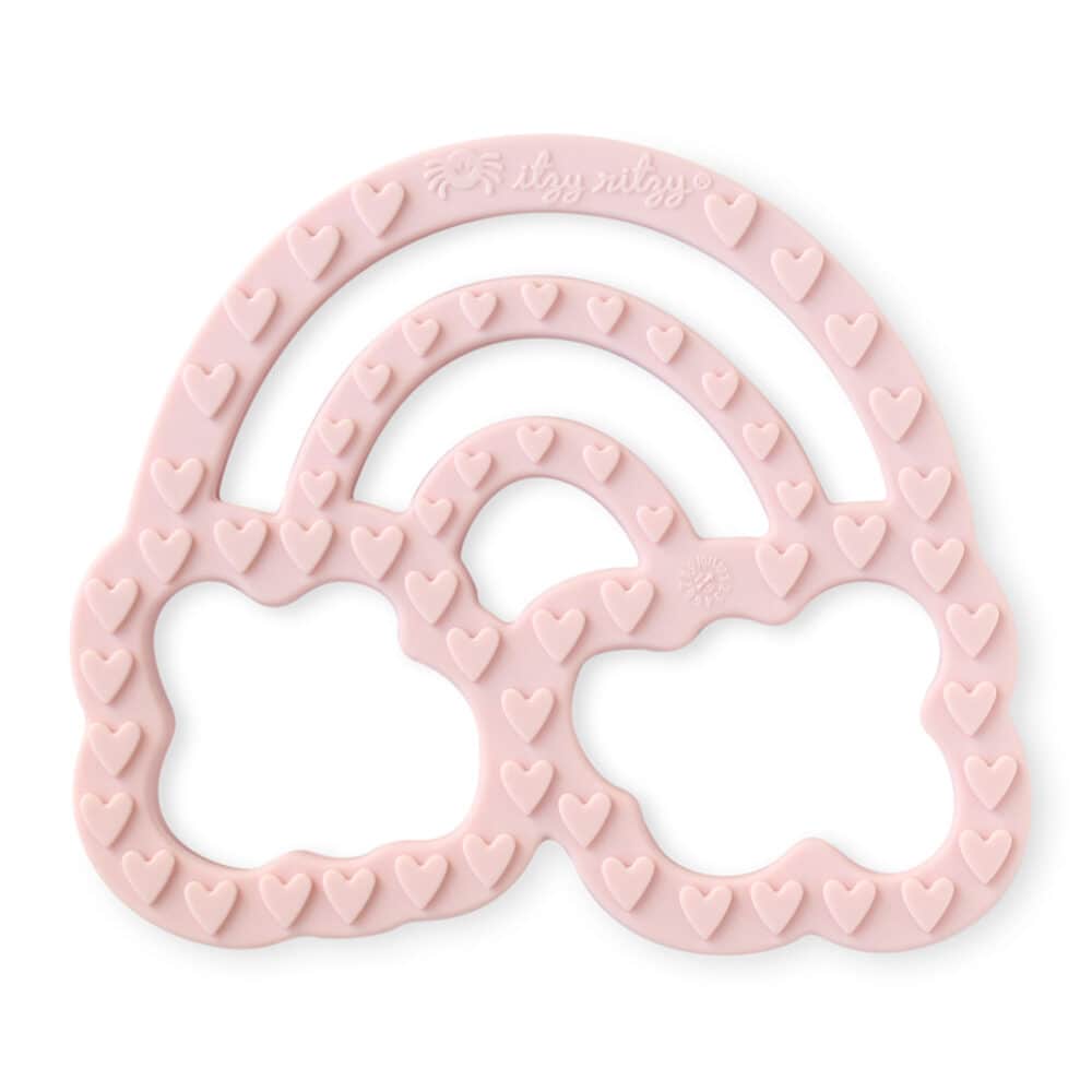 A pink heart shaped teether with hearts on it.