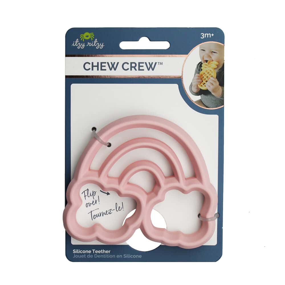 A pink chew crew teether in a package.