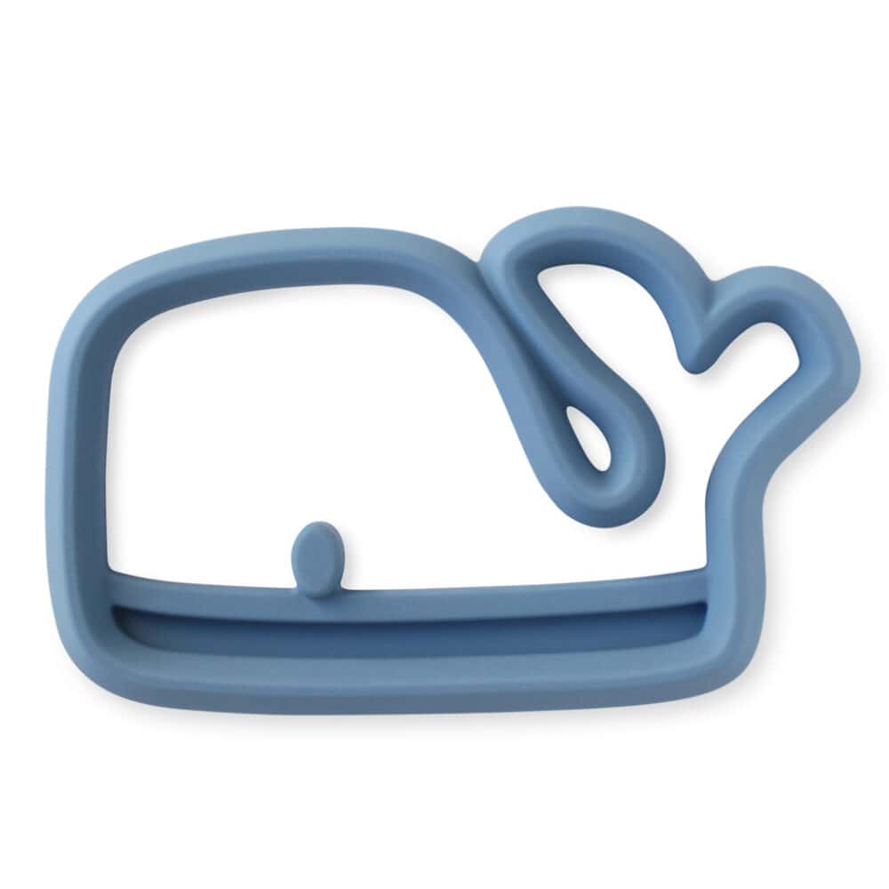 A blue whale shaped teether on a white background.