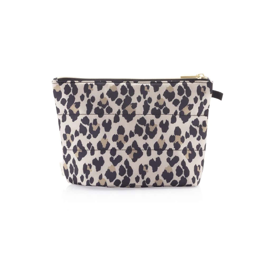A leopard print Itzy Ritzy Pack Like A Dream Packing Cubes - Set of 3 cosmetic bag with a gold zipper.