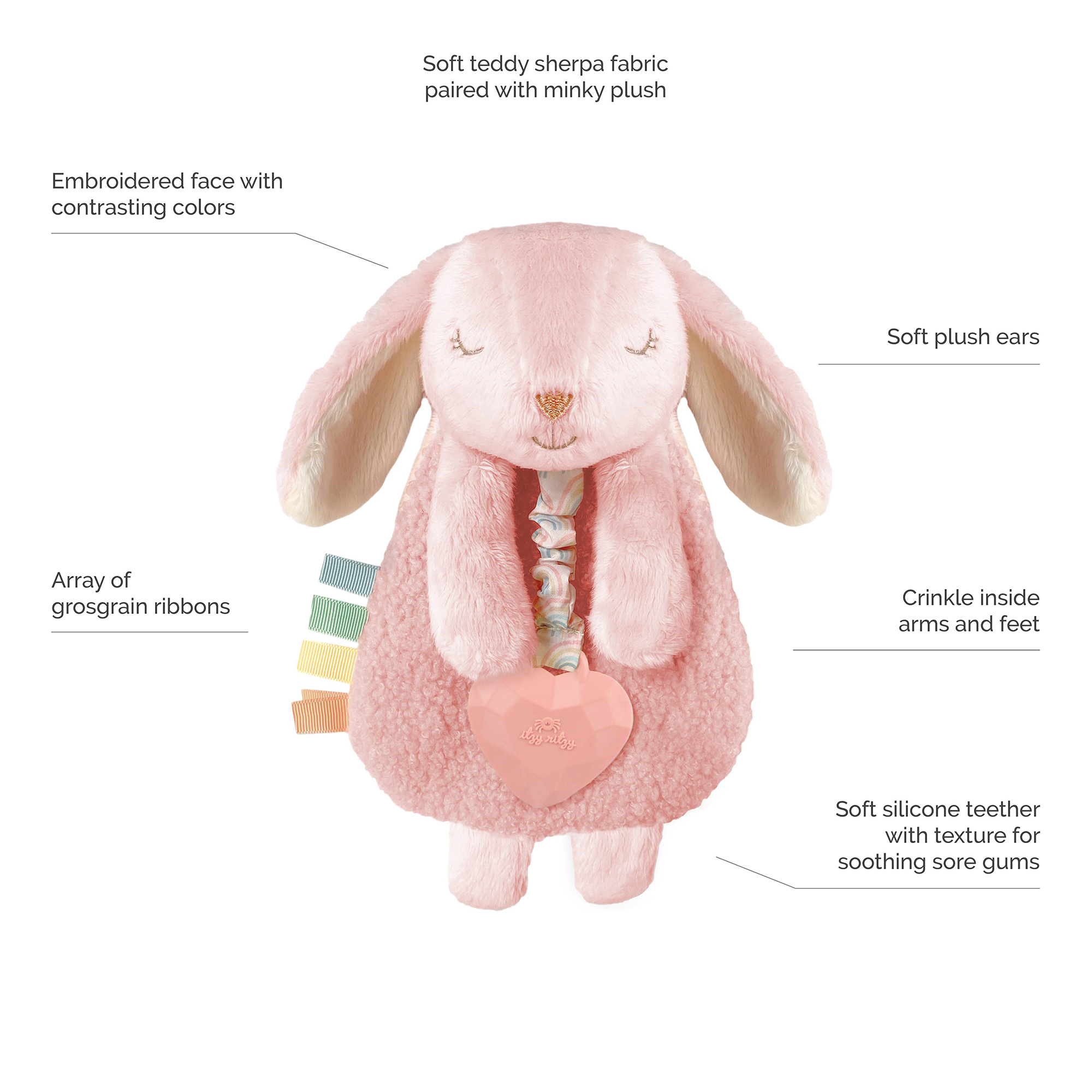Plush pink bunny toy with embroidered face, soft plush ears, crinkle arms and feet, an array of grosgrain ribbons, and a soft silicone teether attached to a rattle heart.
