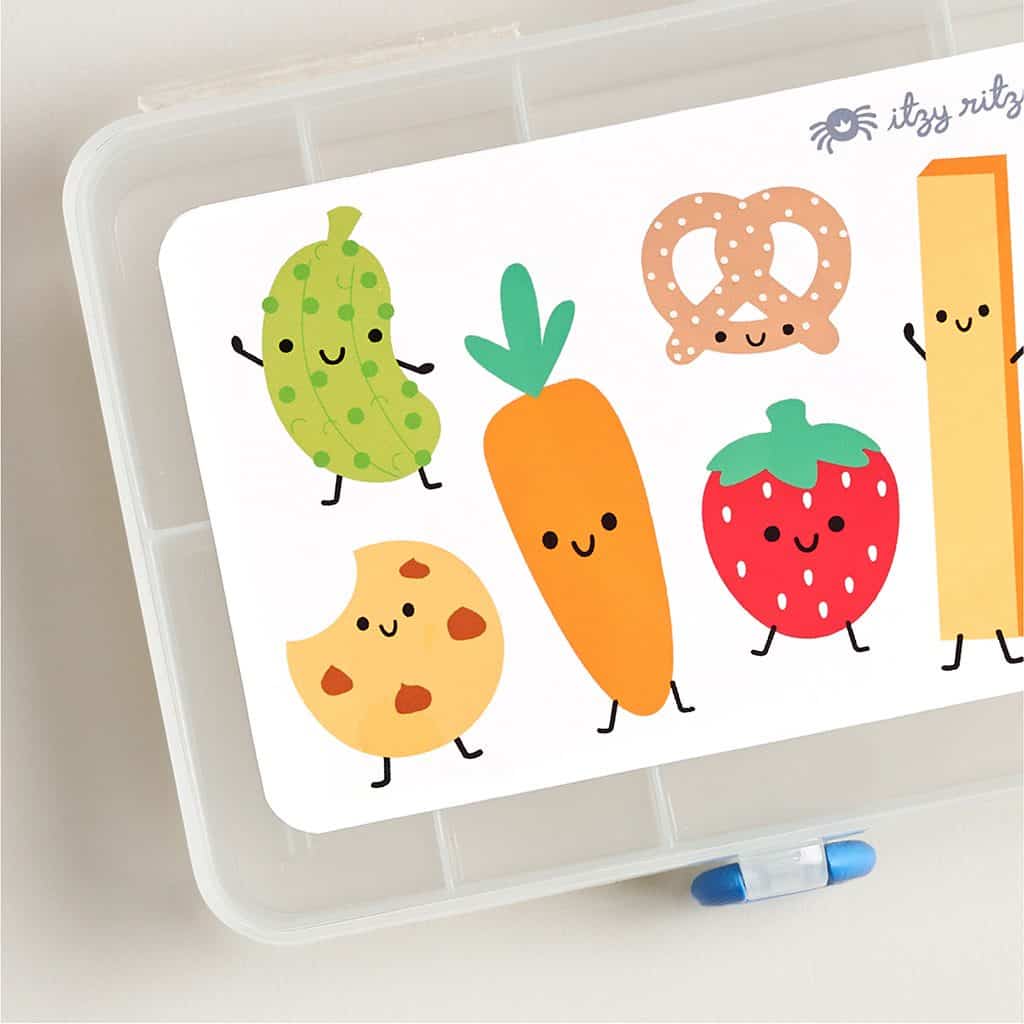 Itzy Ritzy Itzy Snacks divided snack box in the Silly Foods design Itzy Ritzy Itzy Snacks divided snack box in the Silly Foods design