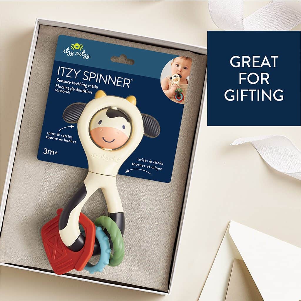 Itzy Ritzy Itzy Spinner sensory teething rattle in the Cow design Itzy Ritzy Itzy Spinner sensory teething rattle in the Cow design