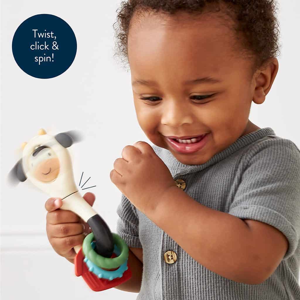 Itzy Ritzy Itzy Spinner sensory teething rattle in the Cow design Itzy Ritzy Itzy Spinner sensory teething rattle in the Cow design