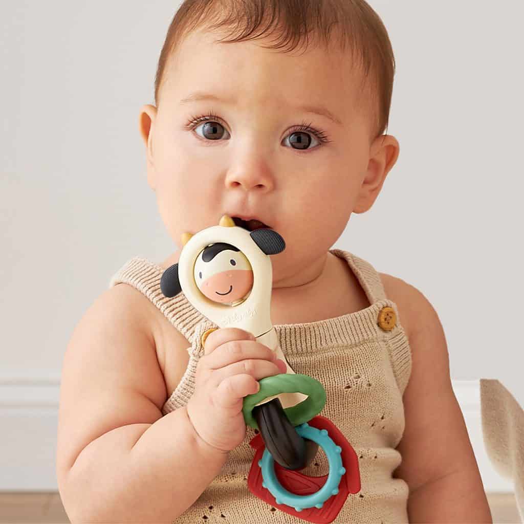 Itzy Ritzy Itzy Spinner sensory teething rattle in the Cow design Itzy Ritzy Itzy Spinner sensory teething rattle in the Cow design