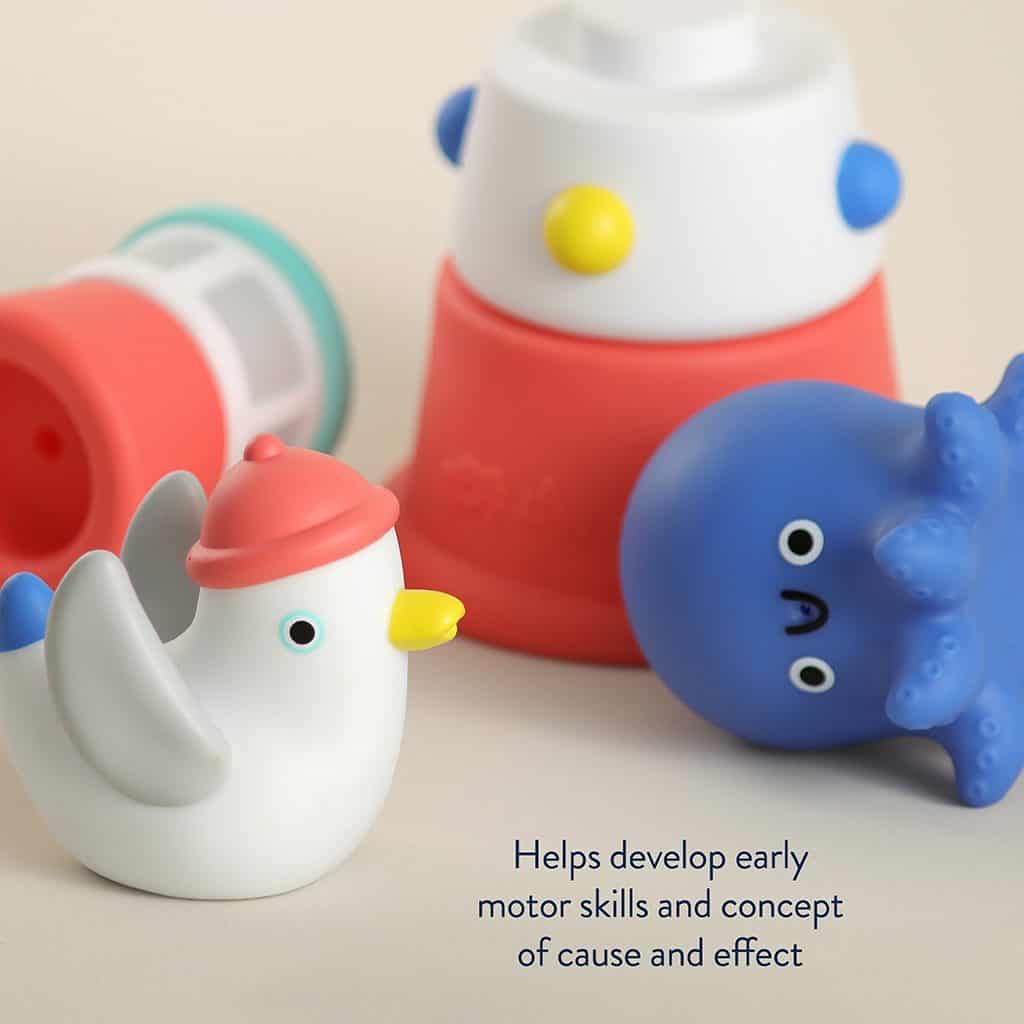Itzy Ritzy Stack and Squirt stackable lighthouse bath toy with octopus and seagull squirters Itzy Ritzy Stack and Squirt stackable lighthouse bath toy with octopus and seagull squirters