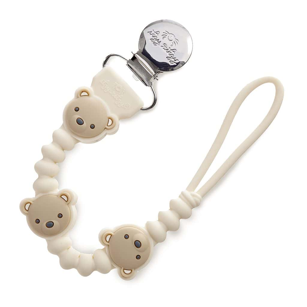 itzy-strap-plus-bear-01 Cream-colored pacifier clip with three bear faces, silicone beads, and a metal clasp at one end, with a loop at the other end for attaching a pacifier.