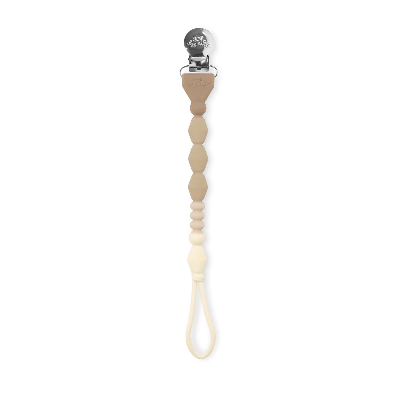 itzy-strap-plus-toast-01 Beige silicone pacifier clip with geometric beads and a metal clasp at the top.