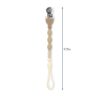 itzy-strap-plus-toast-03 Beige silicone pacifier clip with geometric bead design, metal clasp at one end, and loop at the other; length is 9.75 inches.