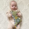 Itzy Ritzy Bitzy Traveler sensory travel toy Dino product photo 2 Itzy Ritzy Bitzy Traveler sensory travel toy Dino product photo 2