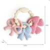 Itzy Ritzy Itzy Trio silicone teether Bows Itzy Ritzy Itzy Trio multi textured silicone teether in the Bows style