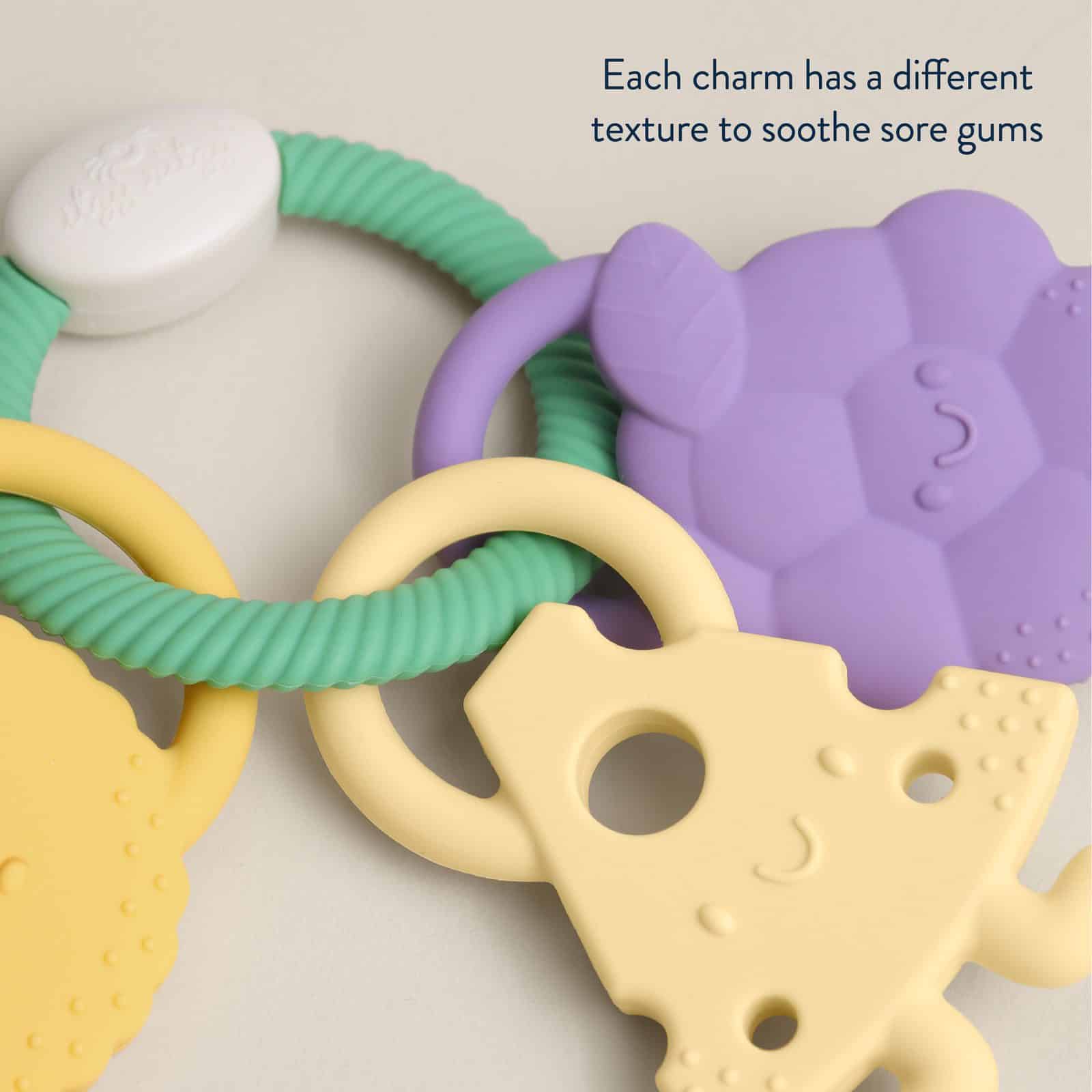 Itzy Ritzy Itzy Trio silicone teether Charcuterie Itzy Ritzy Itzy Trio multi textured silicone teether in the Charcuterie style