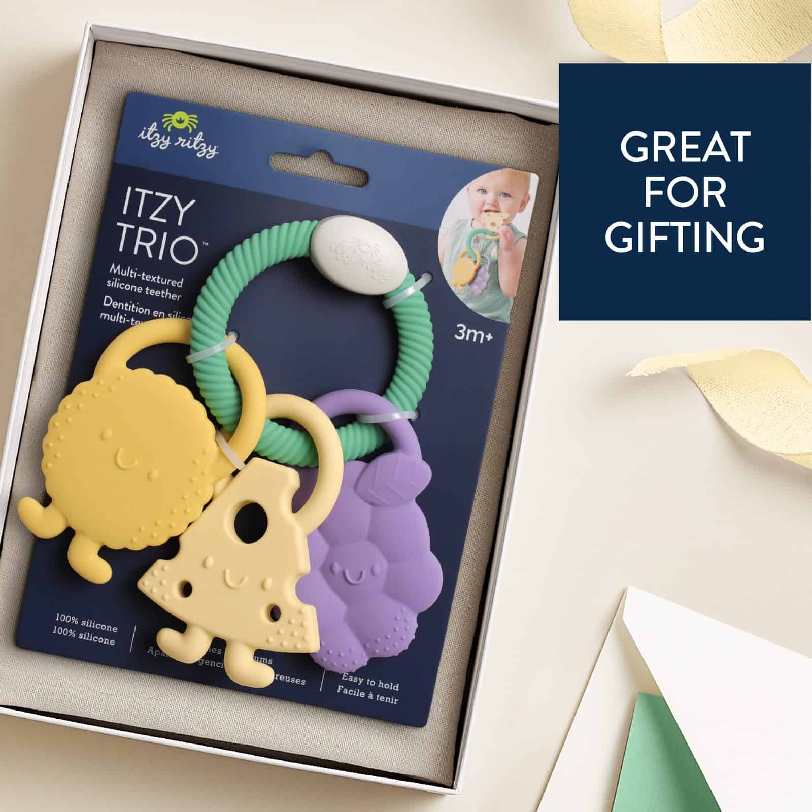 Itzy Ritzy Itzy Trio silicone teether Charcuterie Itzy Ritzy Itzy Trio multi textured silicone teether in the Charcuterie style
