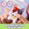 nanomals-118 A hand holds the Hasbro Nano mals Purrnelope Calico Kitty Electronic Pet Interactive Fidget Toy, which is shaped like a cat with a heart on its body. Text reads, “Hold nose for 2 secs for silent mode.” Icons show a finger pressing the cat’s nose and a muted speaker.