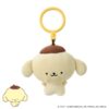 punicommu-nuikeychain-5 Punirunes PuniCommu Sanrio Characters Plush Keychain Bag Charm featuring a cream-colored dog with a brown beret, round ears, and a smiling face, accented by a yellow plastic ring attached at the top. Includes a small illustration of the same character in the bottom left corner.