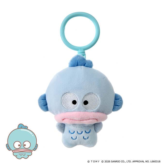 punicommu-nuikeychain-6 A Punirunes PuniCommu Sanrio Characters Plush Keychain Bag Charm featuring a blue fish with large eyes, a small fin on top, and a teal plastic clip; includes a cartoon illustration of the fish in the lower left corner.