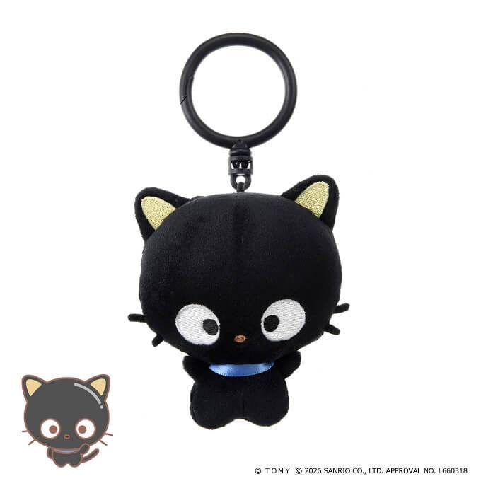 punicommu-nuikeychain-7 A Punirunes PuniCommu Sanrio Characters Plush Keychain Bag Charm featuring a black Kuromi cat with yellow inner ears, white eyes, and a blue collar. In the bottom left corner, there is a small illustration of the same Kuromi character.