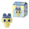 tamagotchi-frienddoll-1 Bandai Tamagotchi Otomodachi Friend Doll Flocked Figure: a yellow Mametchi character with blue ears and hat is pictured beside its box, which features matching artwork, Japanese text, and images of other possible character toys from the blind box shokugan series.
