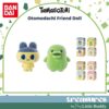 tamagotchi-frienddoll Two Bandai Tamagotchi Otomodachi Friend Doll Flocked Figures—Mametchi and Kuchipatchi—are displayed alongside six boxed Blind Box Shokugan versions on the right. The Bandai logo is featured in the top left corner, with branding text above and below the toys.