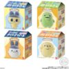 tamagotchi-frienddoll-2 Four boxes display Bandai Tamagotchi Otomodachi Friend Doll Flocked Figures—Mametchi, Kuchipatchi, Mimitchi, and Pochitchi—from the Tamagotchi series, each featured on the front of their respective Blind Box packaging.