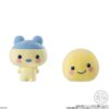 tamagotchi-frienddoll-7 Here’s a rewritten sentence using your product data: Two Bandai Tamagotchi Otomodachi Friend Doll Flocked Figures from the Shokugan Blind Box series: one features Mametchi with a blue cap and ears, while the other is Kuchipatchi—a simple yellow round shape with a smiling face.