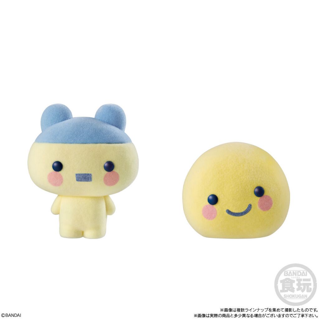 tamagotchi-frienddoll-7 Here’s a rewritten sentence using your product data: Two Bandai Tamagotchi Otomodachi Friend Doll Flocked Figures from the Shokugan Blind Box series: one features Mametchi with a blue cap and ears, while the other is Kuchipatchi—a simple yellow round shape with a smiling face.